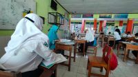 Sekolah Tatap Muka Hari Pertama di Kota Malang, Guru Mengaku Kewalahan